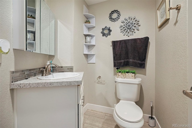 3340 Afternoon Cir, Colorado Springs, CO 80910 - half bath with baseboards and vanity