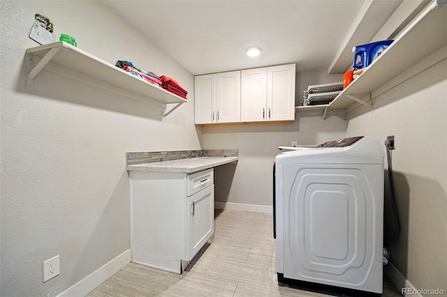 3340 Afternoon Cir, Colorado Springs, CO 80910 - laundry area featuring washer and dryer and cabinet space