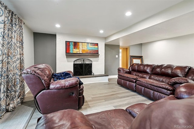 3340 Afternoon Cir, Colorado Springs, CO 80910 - living room with a fireplace, wood finished floors, and recessed lighting