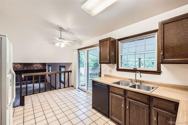 2556 S Eagle Cir, Aurora, CO 80014 - kitchen with dishwasher, a sink, light countertops, ceiling fan, and vaulted ceiling
