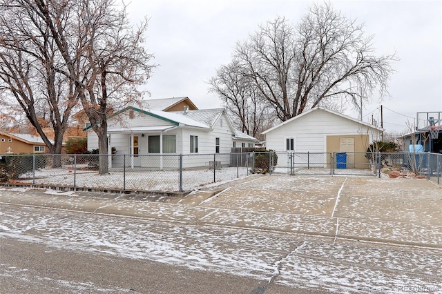 bungalow-style home featuring fence private yard and a gate