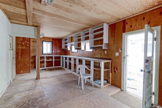 kitchen with open shelves and wooden ceiling