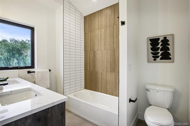 full bathroom featuring vanity, bathing tub / shower combination, tile patterned floors, and toilet