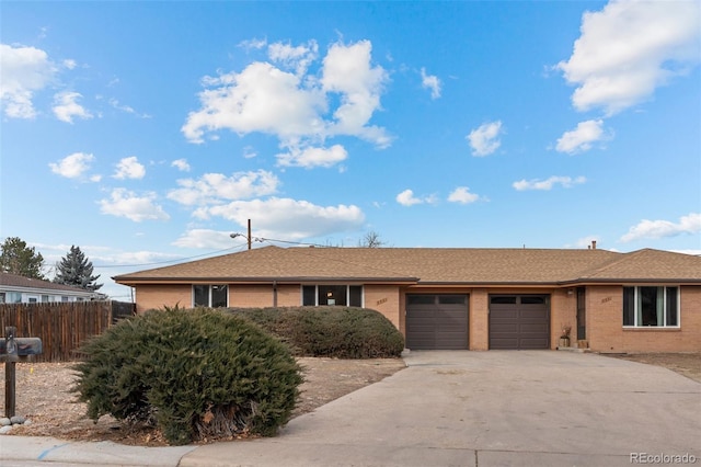 ranch-style home with a garage