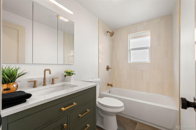 bathroom with toilet, vanity, and shower / tub combination