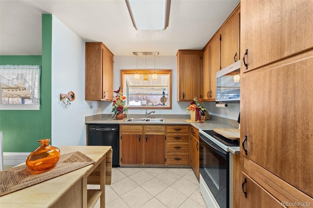 kitchen with electric range oven, black dishwasher, sink, hanging light fixtures, and light tile patterned flooring