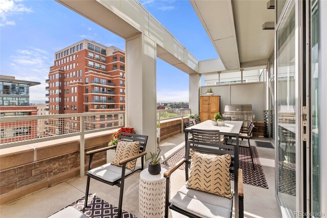 1610 Little Raven St Unit Ph6, Denver, CO 80202 - balcony featuring an outdoor kitchen and grilling area