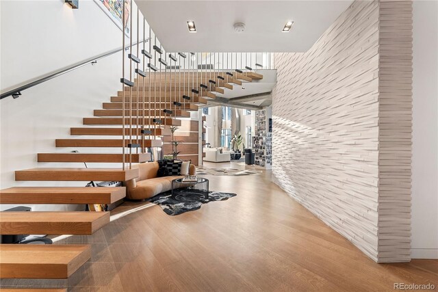 1610 Little Raven St Unit Ph6, Denver, CO 80202 - stairs featuring wood finished floors