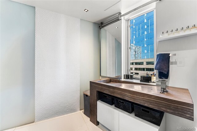 1610 Little Raven St Unit Ph6, Denver, CO 80202 - bathroom featuring wallpapered walls