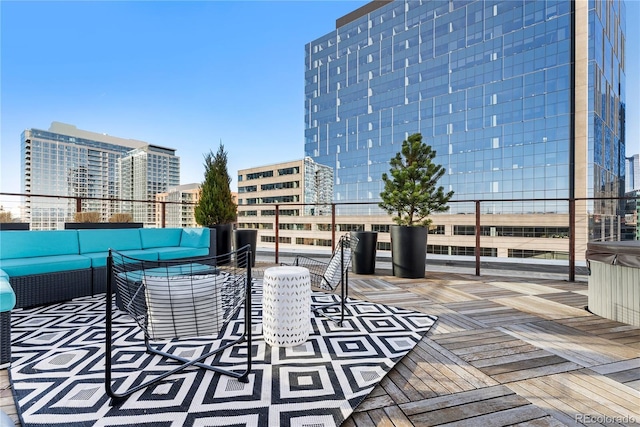 1610 Little Raven St Unit Ph6, Denver, CO 80202 - wooden deck featuring an outdoor living space