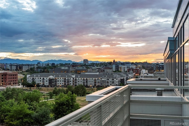 1610 Little Raven St Unit Ph6, Denver, CO 80202 - balcony at dusk with a mountain view and a view of city