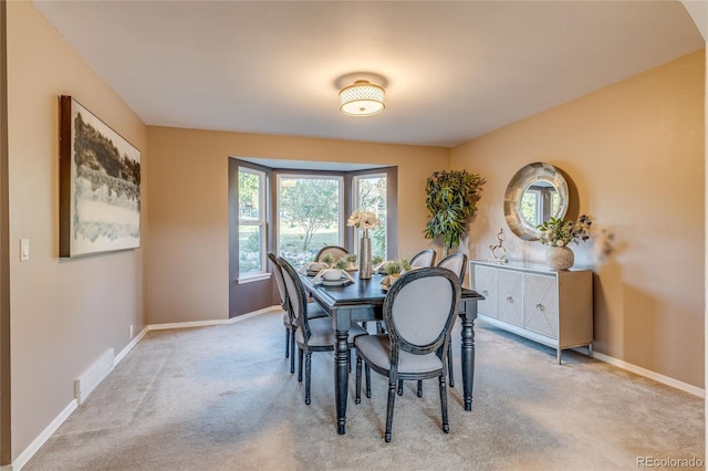 14915 Gleneagle Dr, Colorado Springs, CO 80921 - dining space featuring carpet and baseboards
