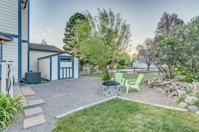 14915 Gleneagle Dr, Colorado Springs, CO 80921 - view of yard with an outdoor fire pit, central air condition unit, and a patio