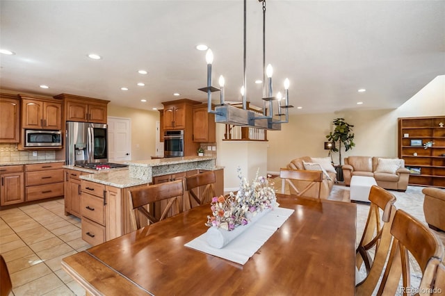 2100 Elk Rdg, Divide, CO 80814 - dining room featuring recessed lighting and light tile patterned flooring