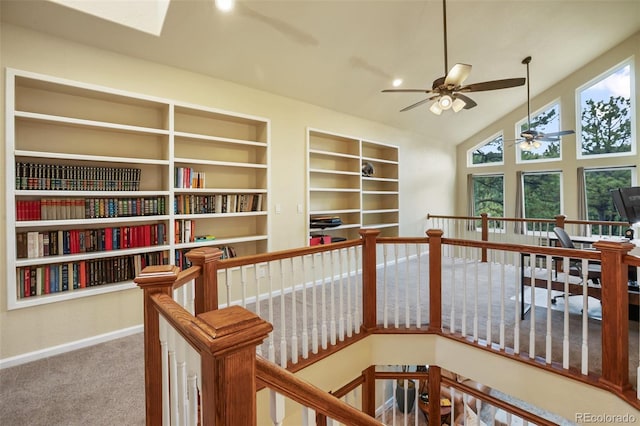 2100 Elk Rdg, Divide, CO 80814 - hallway with healthy amount of natural light, an upstairs landing, and vaulted ceiling