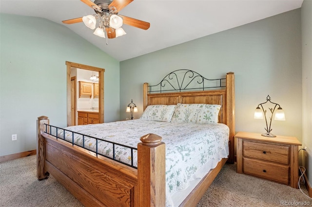 660 Callisto Dr, Loveland, CO 80537 - carpeted bedroom with vaulted ceiling, baseboards, ceiling fan, and connected bathroom
