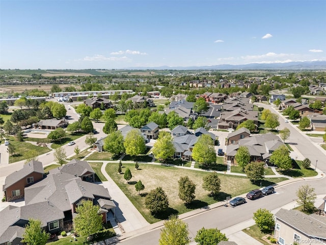 660 Callisto Dr, Loveland, CO 80537 - aerial perspective of suburban area featuring a mountainous background
