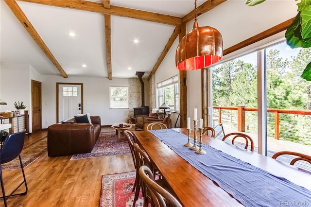 47 Wykagyl Cir, Westcliffe, CO 81252 - dining space featuring recessed lighting, lofted ceiling with beams, a wood stove, and light wood-type flooring