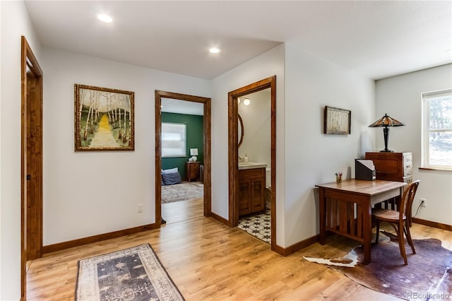 47 Wykagyl Cir, Westcliffe, CO 81252 - corridor featuring baseboards, recessed lighting, and light wood-style flooring