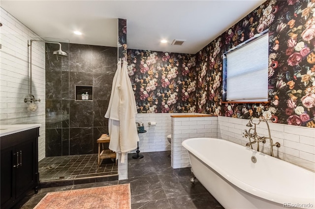 47 Wykagyl Cir, Westcliffe, CO 81252 - bathroom with marble finish floor, a wainscoted wall, wallpapered walls, visible vents, and a soaking tub
