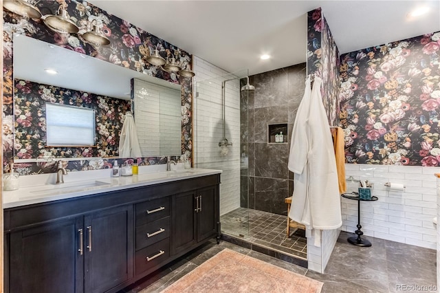 47 Wykagyl Cir, Westcliffe, CO 81252 - full bathroom with double vanity, tile walls, wallpapered walls, a walk in shower, and a sink