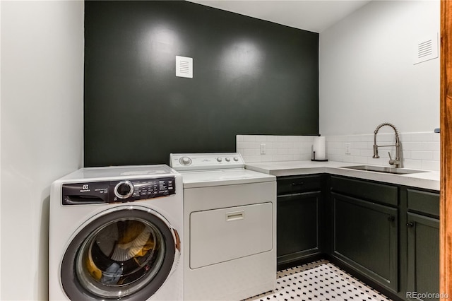 47 Wykagyl Cir, Westcliffe, CO 81252 - laundry area featuring a sink, cabinet space, independent washer and dryer, and visible vents