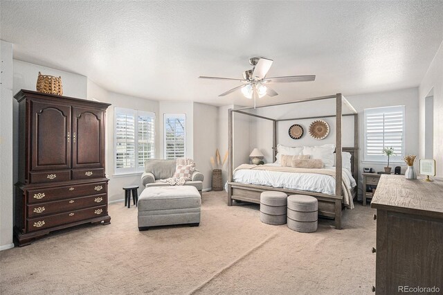 13340 Saint Paul St, Thornton, CO 80241 - bedroom with light colored carpet, multiple windows, a textured ceiling, and a ceiling fan