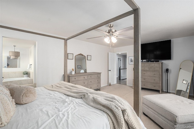 13340 Saint Paul St, Thornton, CO 80241 - bedroom featuring light colored carpet, connected bathroom, and a ceiling fan