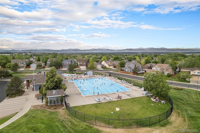 13340 Saint Paul St, Thornton, CO 80241 - community pool with a residential view, a mountain view, and a patio area