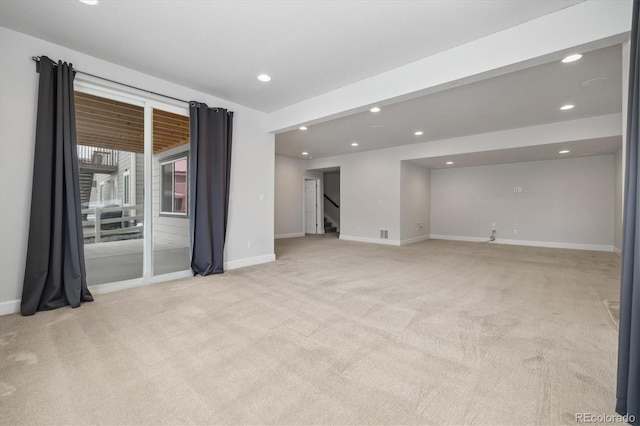 unfurnished room featuring light carpet, recessed lighting, stairs, and baseboards