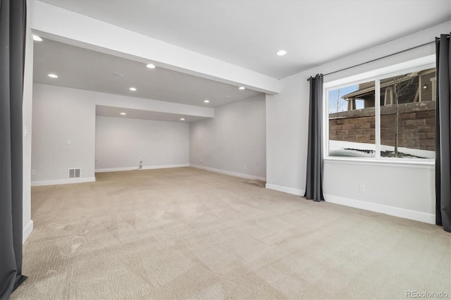 interior space featuring recessed lighting, baseboards, visible vents, and carpet flooring