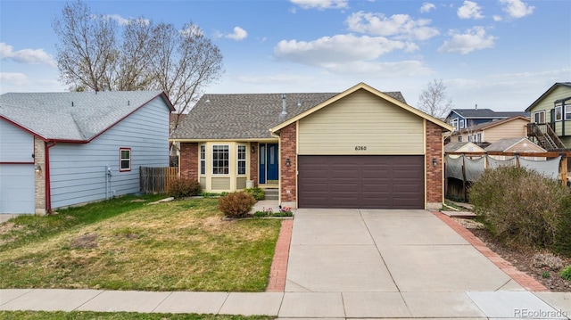 6760 Oakwood Blvd, Colorado Springs, CO 80923 - view of front of home featuring brick siding, a garage, and concrete driveway
