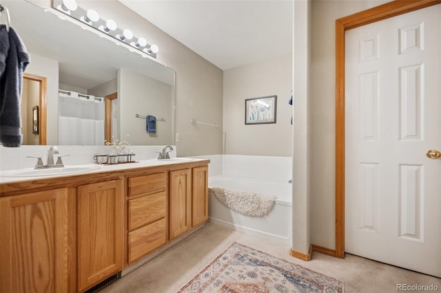 6760 Oakwood Blvd, Colorado Springs, CO 80923 - full bath featuring double vanity and a bath