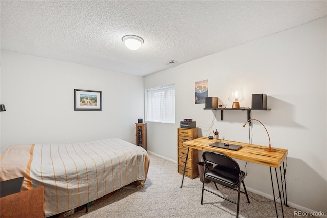 6760 Oakwood Blvd, Colorado Springs, CO 80923 - bedroom with carpet floors, baseboards, and a textured ceiling