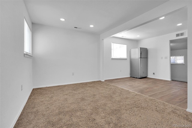 view of carpeted spare room