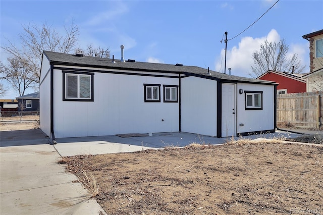 rear view of house featuring a patio