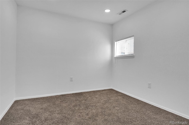 view of carpeted spare room