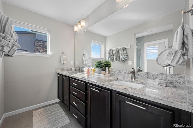 bathroom featuring vanity and tile patterned flooring