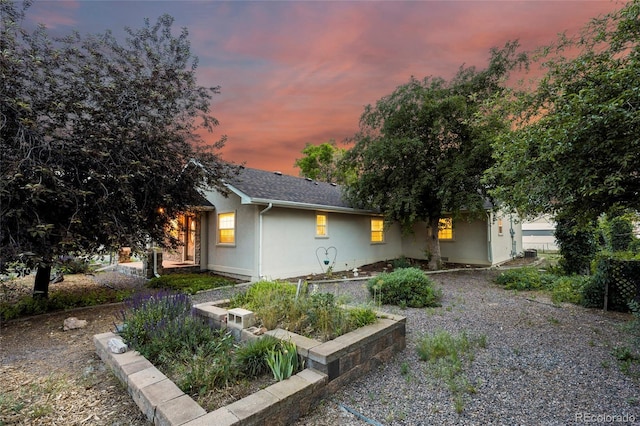 205 Beech St, Hudson, CO 80642 - view of front of house featuring stucco siding