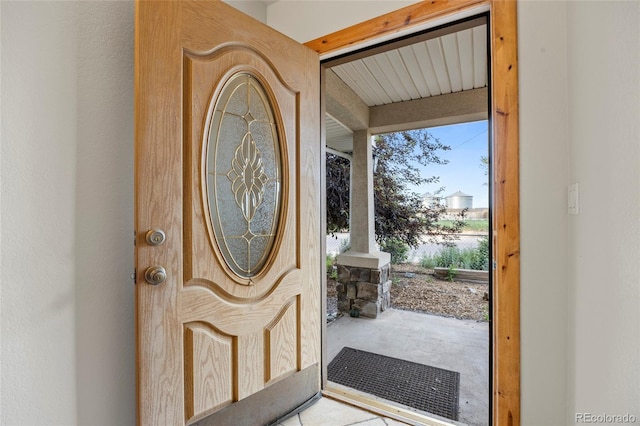 205 Beech St, Hudson, CO 80642 - entryway with beam ceiling