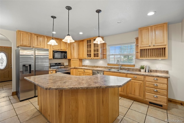 205 Beech St, Hudson, CO 80642 - kitchen with appliances with stainless steel finishes, a kitchen island, open shelves, light tile patterned flooring, and recessed lighting