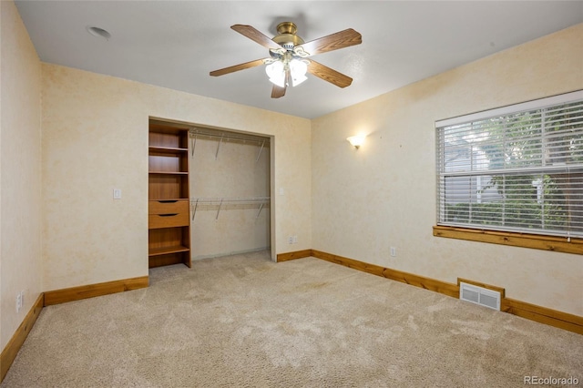 205 Beech St, Hudson, CO 80642 - unfurnished bedroom featuring carpet flooring, a closet, and a ceiling fan