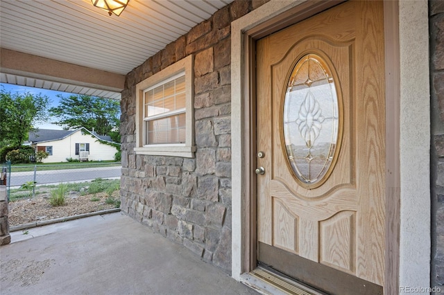 205 Beech St, Hudson, CO 80642 - entrance to property featuring stone siding and a porch