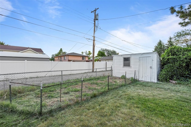 205 Beech St, Hudson, CO 80642 - view of yard featuring a garden and a storage shed
