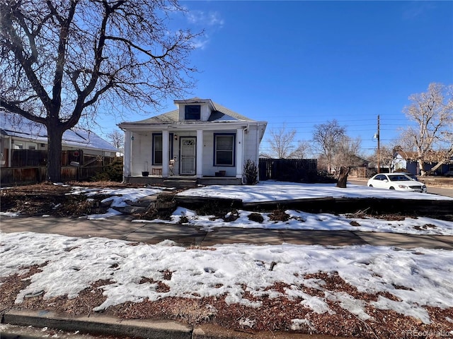 neoclassical home with a porch