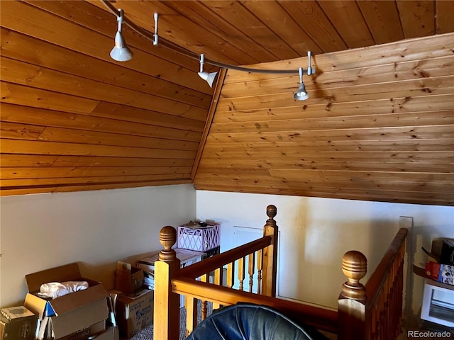 interior space with vaulted ceiling with beams and wood ceiling