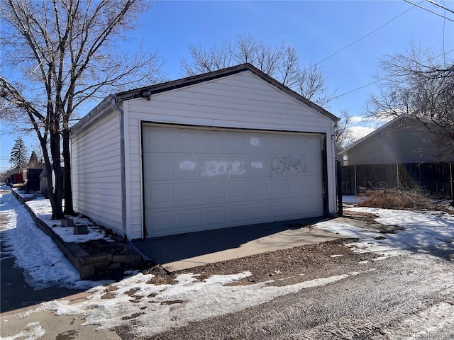 view of snow covered garage