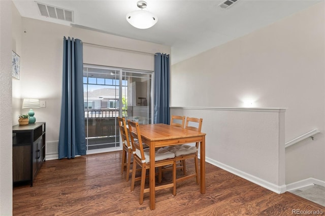 837 E 98th Ave Unit 405, Thornton, CO 80229 - dining room with wood finished floors and baseboards