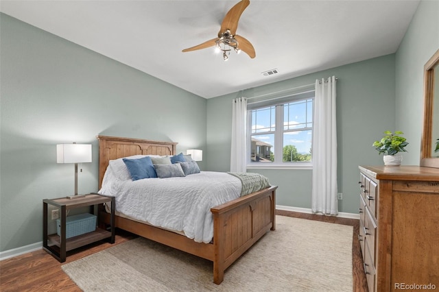 837 E 98th Ave Unit 405, Thornton, CO 80229 - bedroom featuring wood finished floors and a ceiling fan