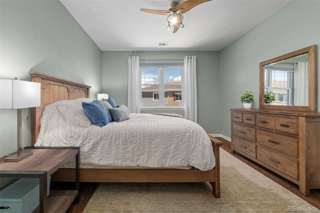 837 E 98th Ave Unit 405, Thornton, CO 80229 - bedroom featuring wood finished floors and ceiling fan